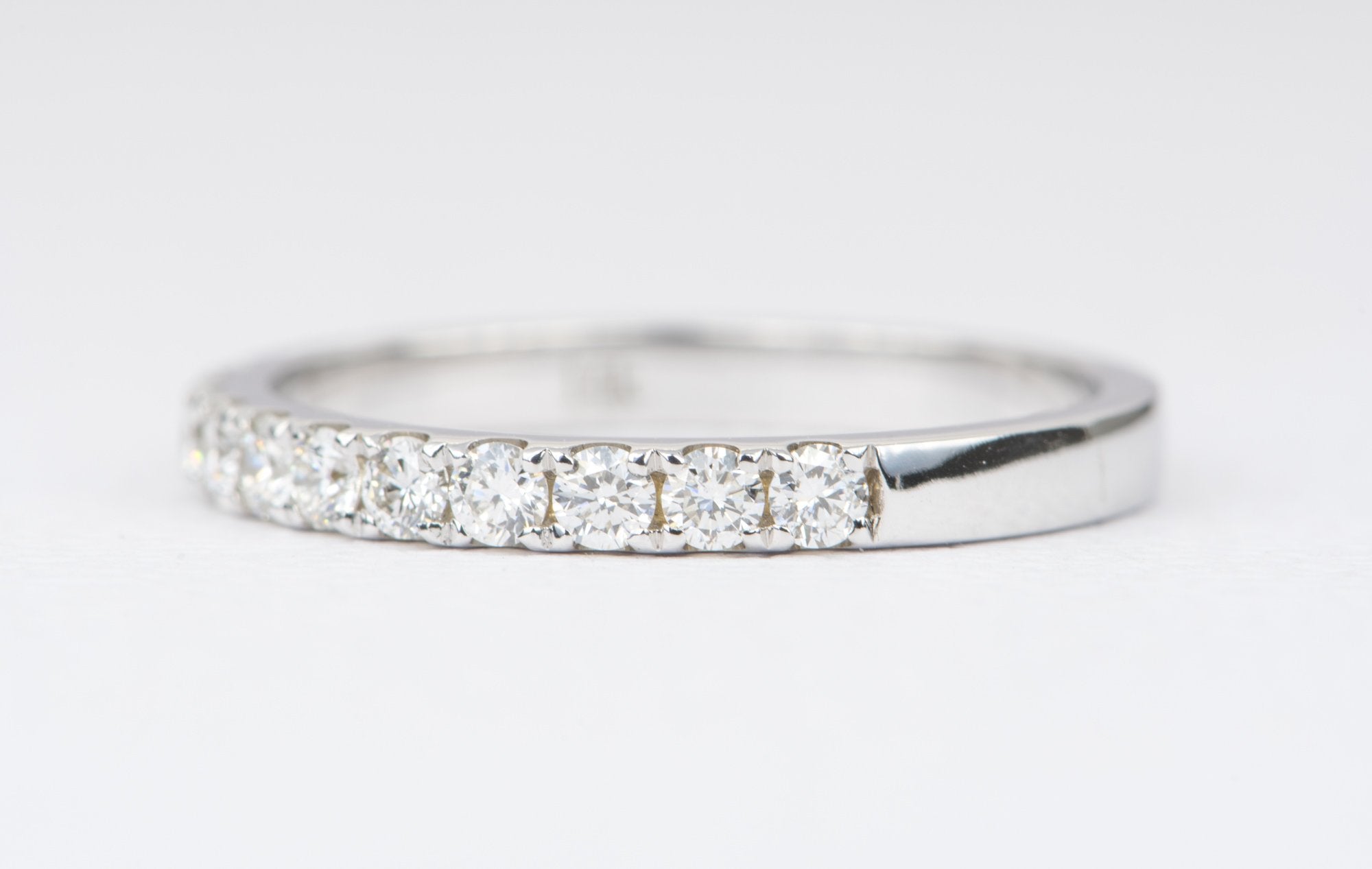 DIAMONDS HALF WAY AROUND WEDDING BAND