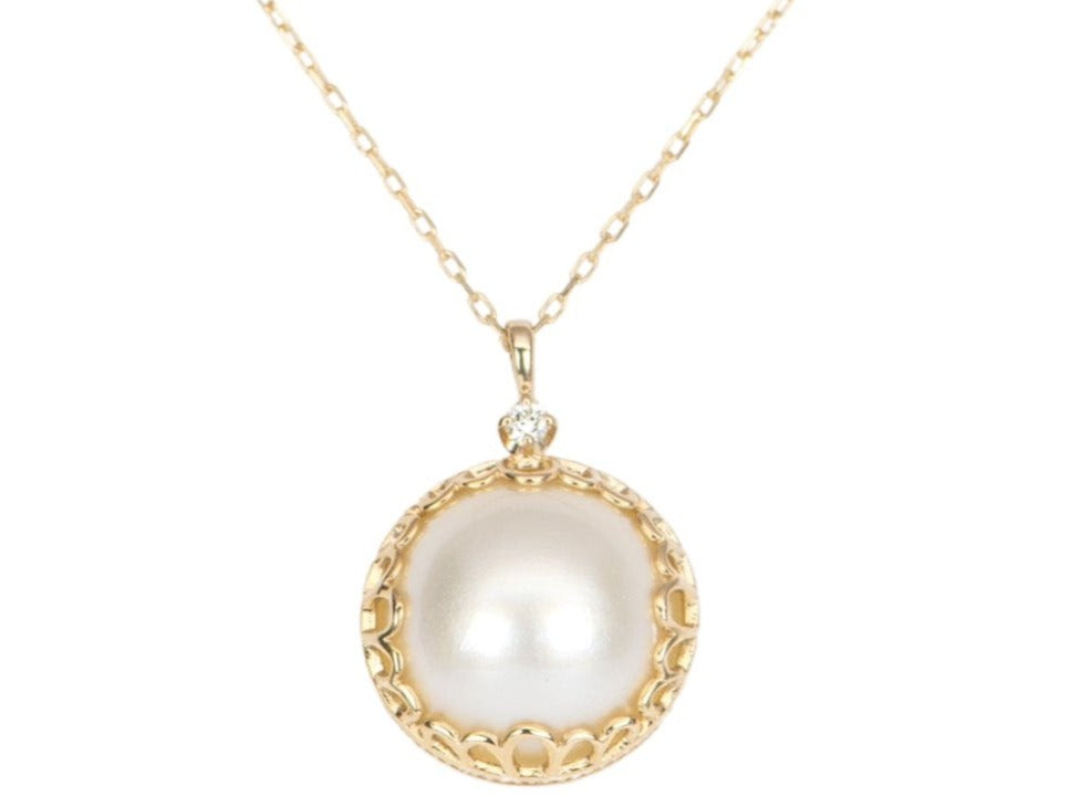 Pearl (sand sold satin, semi-round) and Marble pendant necklace