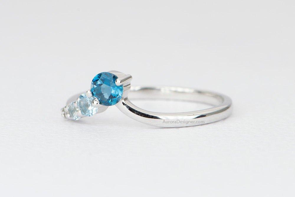 Valentino Ring with Round Blue Topaz, 0.6 carats Round Blue Topaz Wedding  Ring in 14k White Gold