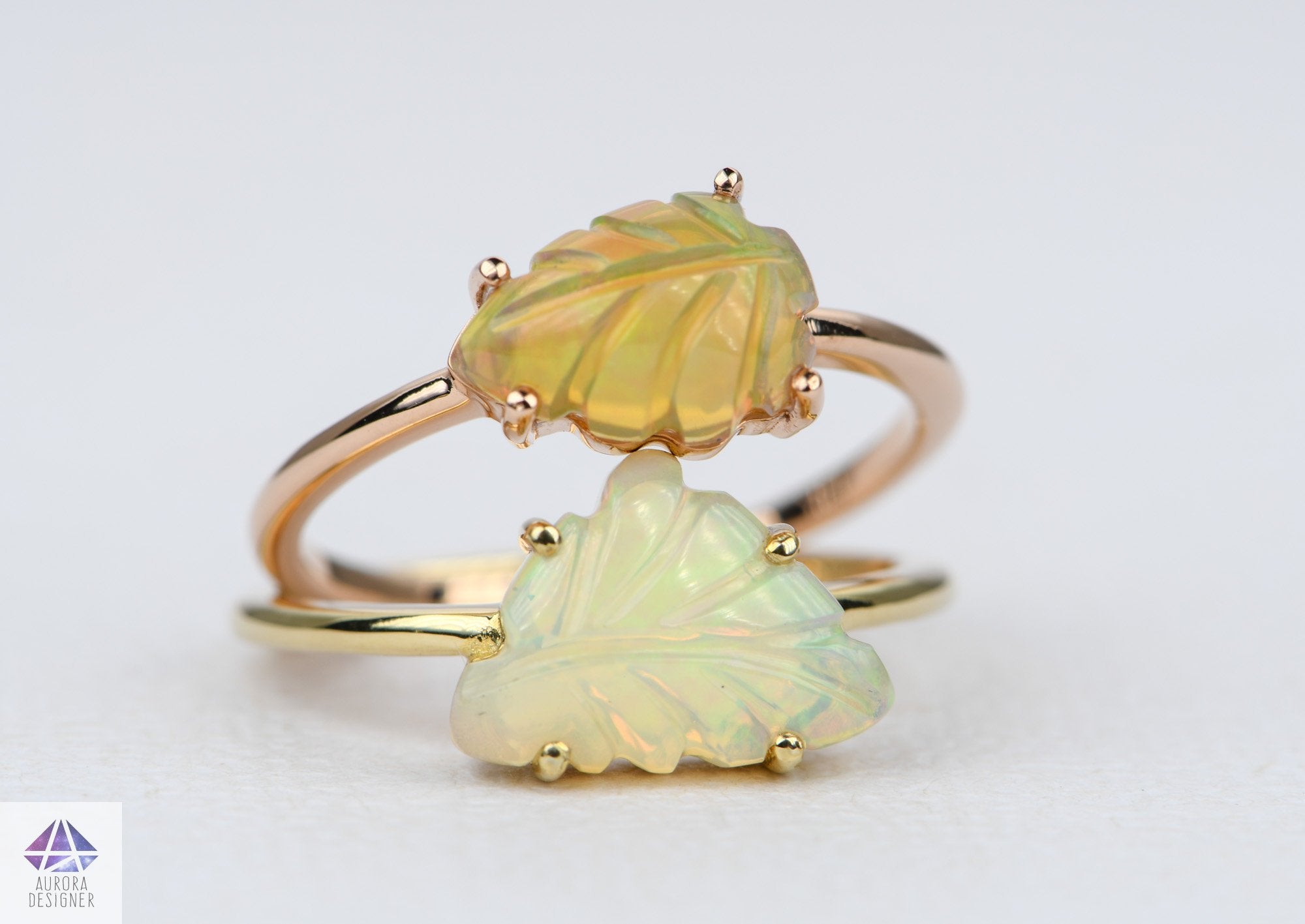 https://www.auroradesigner.com/cdn/shop/products/ethiopian-opal-carving-14k-rose-gold-ring-unique-ooak-carved-gemstone-leaf-nature-inspired-ad2006-2-aurora-designer-461133_5000x.jpg?v=1689357857